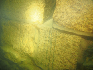 submerged Tytam Took Village outer wall